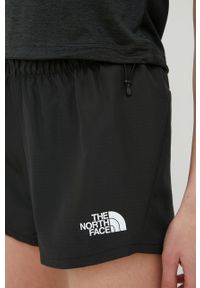 The North Face szorty sportowe Mountain Athletics damskie kolor czarny z nadrukiem medium waist. Kolor: czarny. Materiał: materiał, włókno. Wzór: nadruk. Styl: sportowy #3