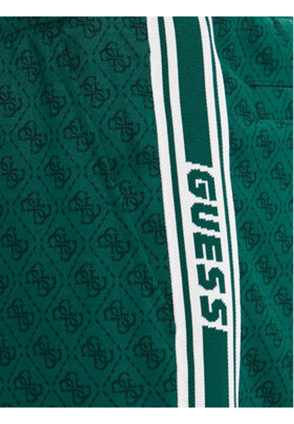 Guess Spodnie dresowe Z5BB19 K2042 Zielony Regular Fit. Kolor: zielony. Materiał: syntetyk