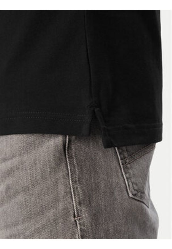 Emporio Armani Polo EM000571 AF20424 UC001 Czarny Regular Fit. Typ kołnierza: polo. Kolor: czarny. Materiał: bawełna