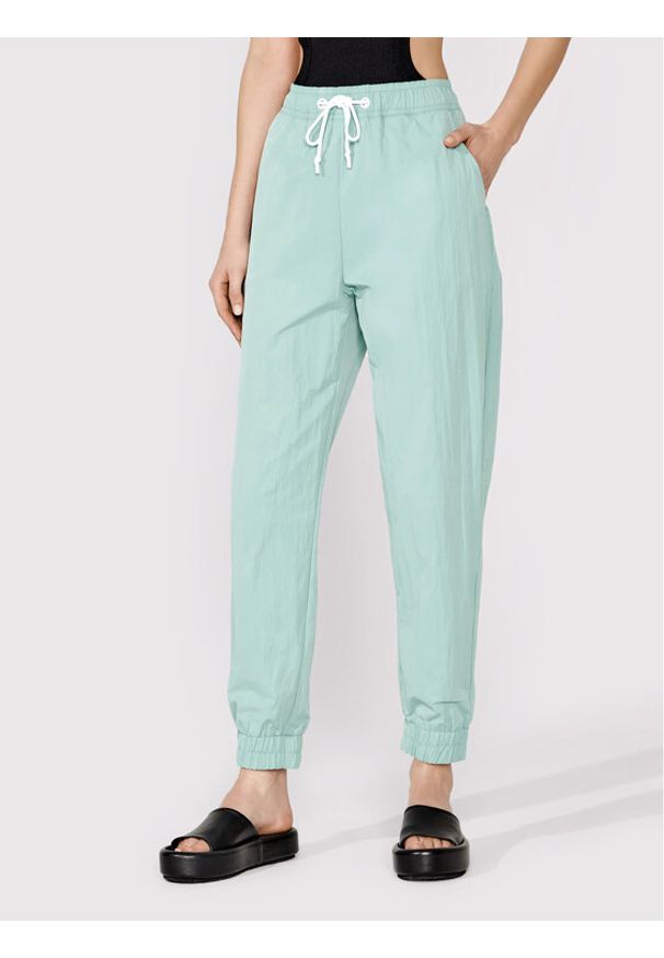 Simple Spodnie dresowe SPD010 Zielony Relaxed Fit. Kolor: zielony. Materiał: syntetyk