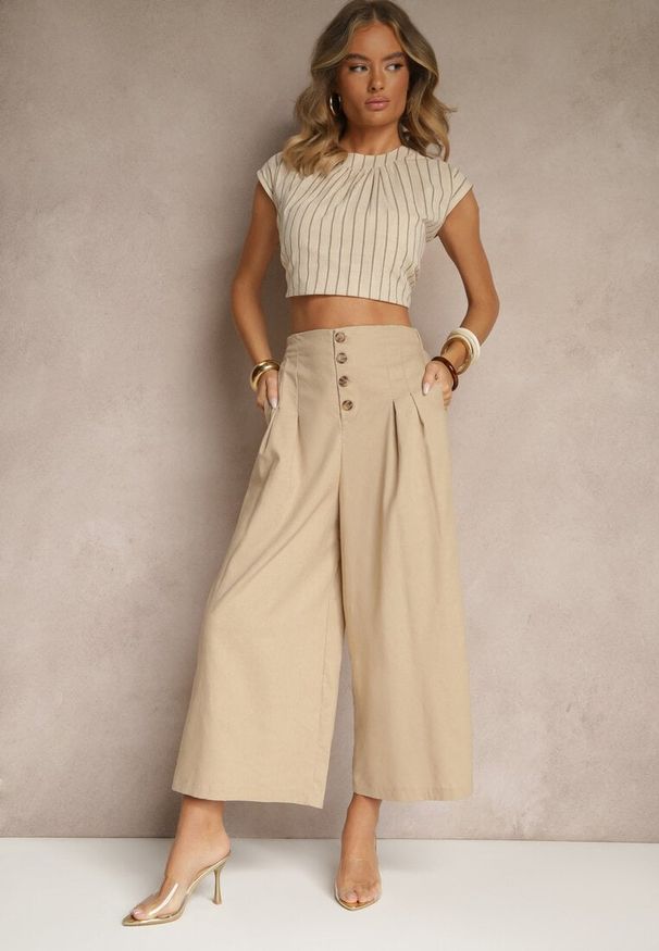 Renee - Ciemnobeżowe Spodnie Culottes High Waist z Bawełny Zdobione Guzikami Izuma. Okazja: na co dzień. Stan: podwyższony. Kolor: beżowy. Materiał: bawełna. Wzór: aplikacja. Styl: elegancki, casual