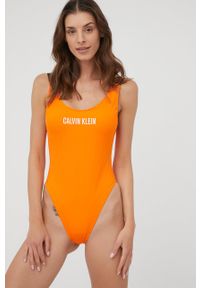 Calvin Klein strój kąpielowy kolor pomarańczowy lekko usztywniona miseczka. Kolor: pomarańczowy. Materiał: materiał, dzianina. Wzór: gładki
