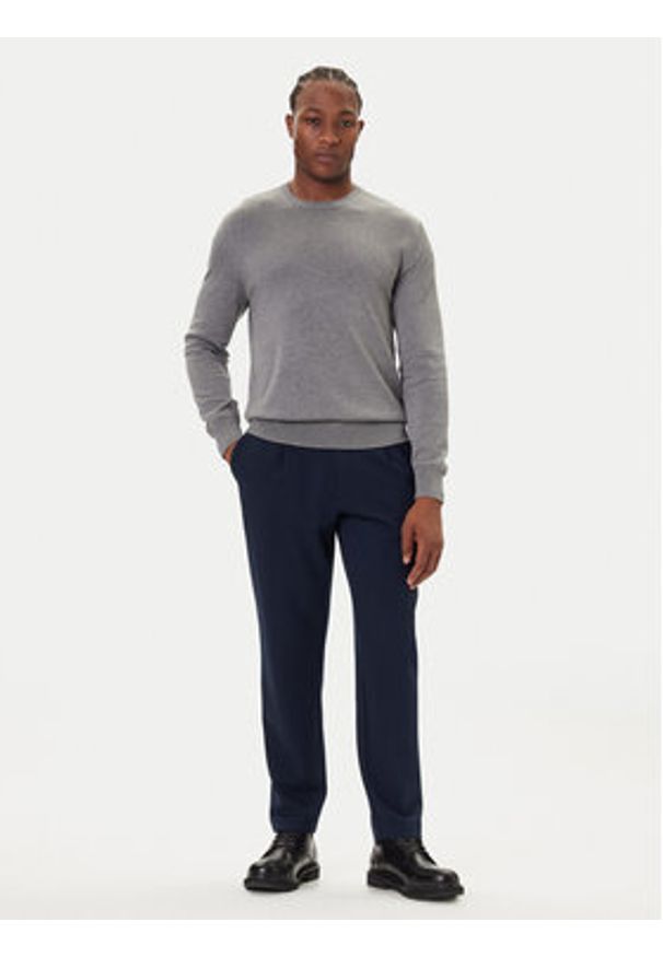 Calvin Klein Chinosy LV04LE613G Granatowy Slim Fit. Kolor: niebieski. Materiał: wiskoza