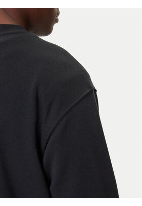 New Balance Bluza Small Logo MT41507 Czarny Relaxed Fit. Kolor: czarny. Materiał: bawełna