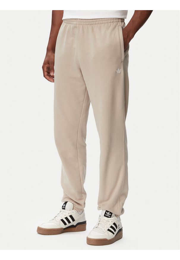 Adidas - adidas Spodnie dresowe Trefoil Essentials French Terry KT2454 Beżowy Regular Fit. Kolor: beżowy. Materiał: bawełna