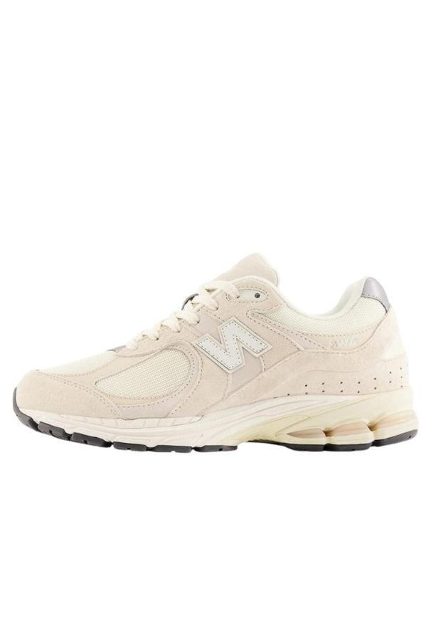 Buty do chodzenia damskie New Balance 2002. Kolor: beżowy. Materiał: skóra. Szerokość cholewki: normalna. Sport: turystyka piesza