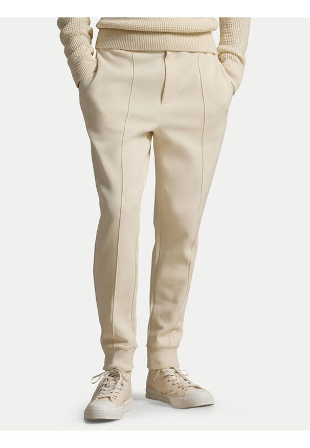 Polo Ralph Lauren Spodnie materiałowe 710B13640003 Beżowy Regular Fit. Kolor: beżowy. Materiał: syntetyk