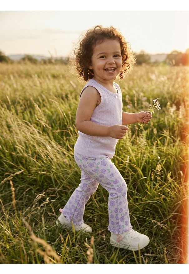 Sinsay - Legginsy flare z motywem kwiatowym - fioletowy. Kolor: fioletowy. Wzór: kwiaty