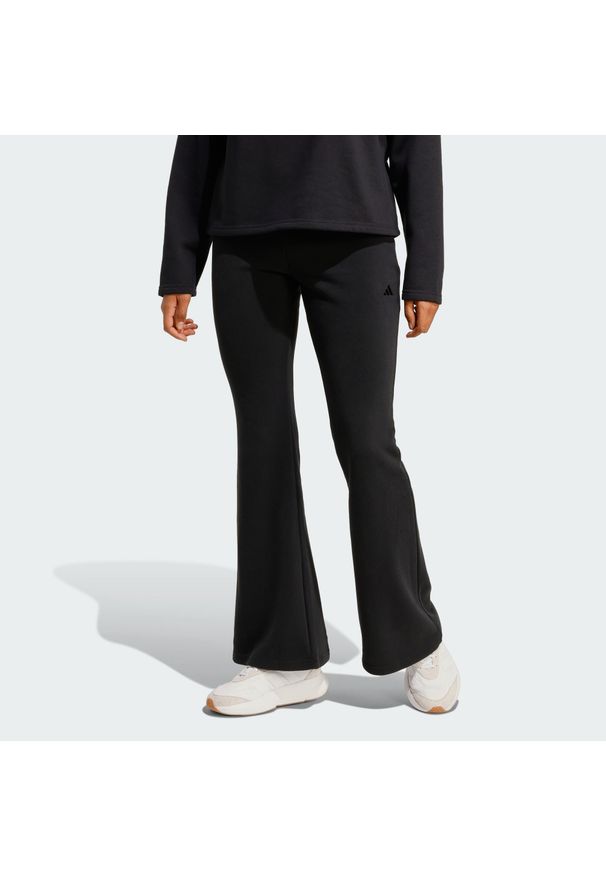 Adidas - Spodnie Seasonal Essentials French Terry Flared. Kolor: czarny. Sport: fitness