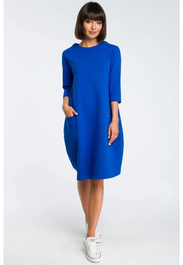 Sukienki.shop - Sukienka dresowa bombka oversize z kieszonką niebieska. Okazja: na co dzień. Kolor: niebieski, szary. Materiał: dresówka. Typ sukienki: oversize, bombki. Styl: casual