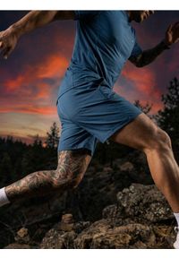 Sinsay - Szorty sportowe SNSY PERFORMANCE - niebieski. Kolor: niebieski. Styl: sportowy #1