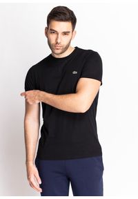 Koszulka męska Lacoste T-Shirt (TH6709-031). Typ kołnierza: polo. Kolor: czarny. Materiał: dzianina. Długość: krótkie. Sezon: lato. Sport: bieganie