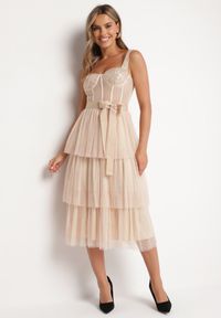 Born2be - Beżowa Sukienka Koktajlowa z Gorsetową Górą Falbanami Cekinami i Kokardą Loralina. Typ kołnierza: kokarda, dekolt gorset. Kolor: beżowy. Długość rękawa: na ramiączkach. Wzór: aplikacja. Typ sukienki: gorsetowe. Styl: wizytowy #5