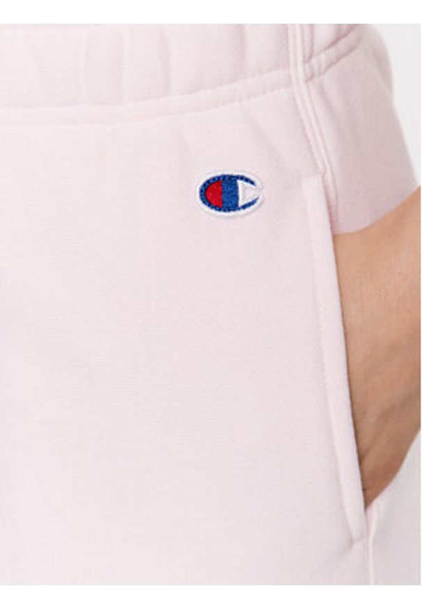 Champion Spodnie dresowe 116243 Różowy Regular Fit. Kolor: różowy. Materiał: bawełna