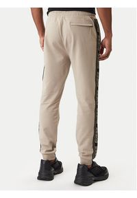 Guess Spodnie dresowe Z2YB19 K6ZS1 Beżowy Regular Fit. Kolor: beżowy. Materiał: bawełna #5