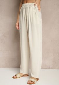 Renee - Jasnobeżowe Spodnie z Bawełną o Szerokim Kroju High Waist Fanelithia. Okazja: na co dzień. Stan: podwyższony. Kolor: beżowy. Materiał: bawełna. Styl: casual #4