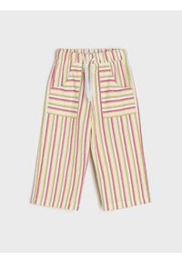 Sinsay - Spodnie tkaninowe w paski - wielobarwny. Materiał: tkanina. Wzór: paski #1