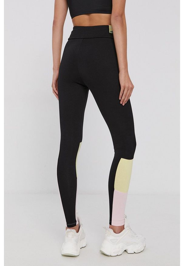 Puma - Legginsy. Stan: podwyższony. Kolor: czarny. Materiał: dzianina