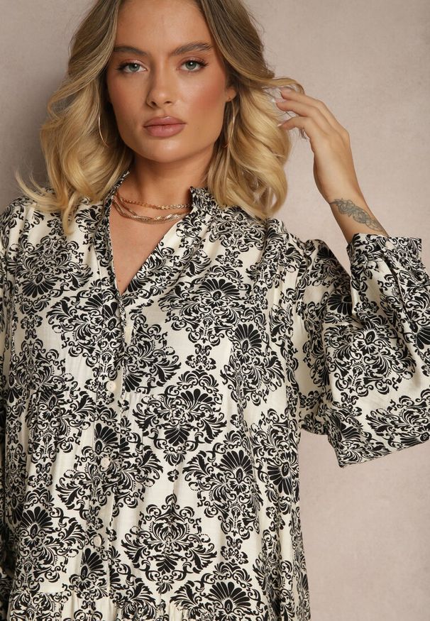 Renee - Czarna Wiskozowa Sukienka w Ornamentalny Wzór o Rozkloszowanym Kroju Gonalia. Okazja: na co dzień. Typ kołnierza: dekolt w kształcie V. Kolor: czarny. Materiał: wiskoza. Długość rękawa: długi rękaw. Typ sukienki: rozkloszowane, oversize. Styl: casual, elegancki