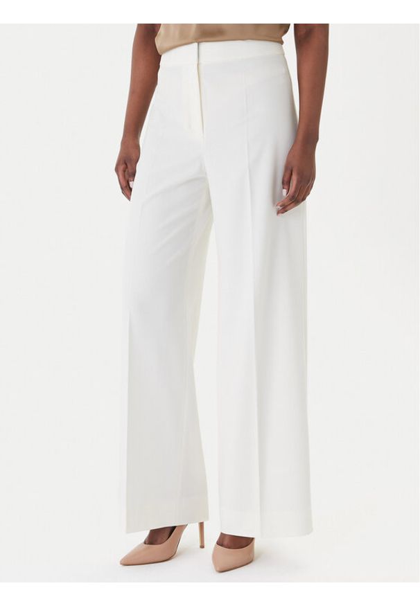 Hugo - HUGO Spodnie materiałowe Huzili 50558131 Écru Wide Leg. Kolor: kremowy. Materiał: wiskoza, syntetyk