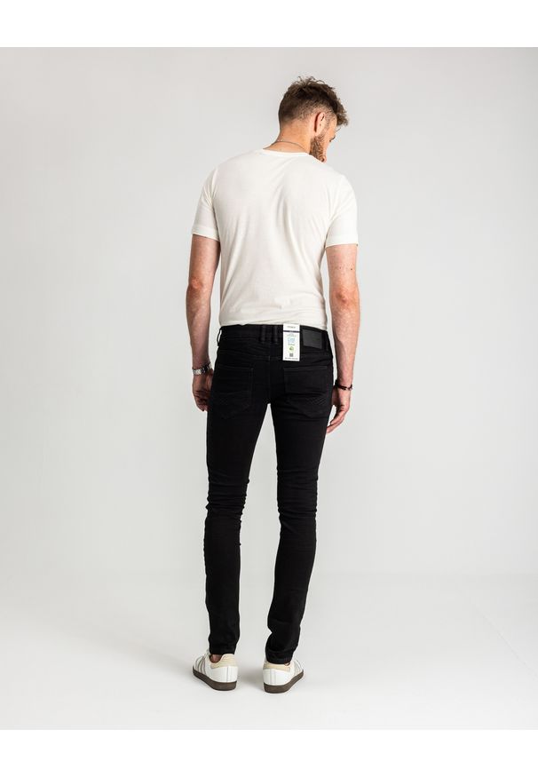 Męskie Spodnie Jeansowe Tom Tailor Troy Czarne Slim Fit 1021160 10270. Okazja: na spotkanie biznesowe, na randkę, na co dzień. Kolor: czarny. Wzór: gładki. Styl: elegancki, casual, klasyczny, biznesowy