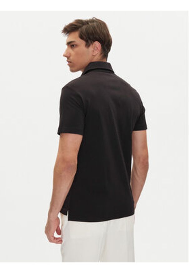 Emporio Armani Polo EM000571 AF12331 UC001 Czarny Regular Fit. Typ kołnierza: polo. Kolor: czarny. Materiał: bawełna