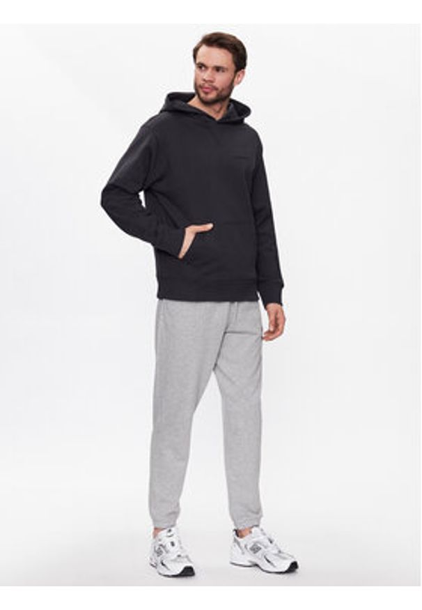 New Balance Bluza Athletics Nature State MT23565 Czarny Relaxed Fit. Kolor: czarny. Materiał: bawełna