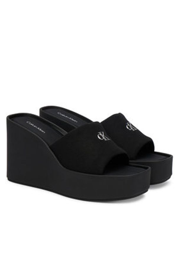 Calvin Klein Klapki Wedge 70 Sndl Canv Mg HW0HW03134 Czarny. Kolor: czarny. Materiał: materiał