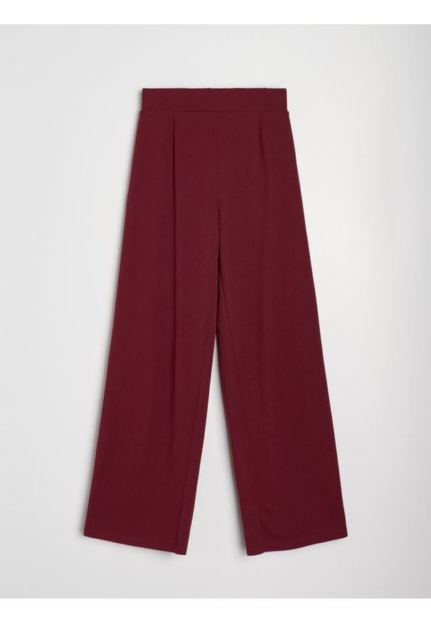 Sinsay - Spodnie wide leg - czerwony. Kolor: czerwony