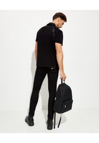 Alexander McQueen - ALEXANDER MCQUEEN - Czarne jeansy z logo. Kolor: czarny #3