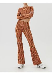 Sinsay - Legginsy flare ze wzorem geometrycznym - wielobarwny. Wzór: geometria #1