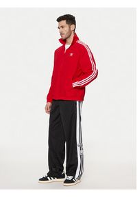 Adidas - adidas Bluza adicolor Firebird IT2495 Czerwony Loose Fit. Kolor: czerwony. Materiał: syntetyk