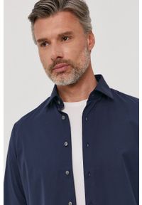 Calvin Klein - Koszula bawełniana. Okazja: na co dzień. Kolor: niebieski. Materiał: bawełna. Długość rękawa: długi rękaw. Długość: długie. Wzór: gładki. Styl: casual