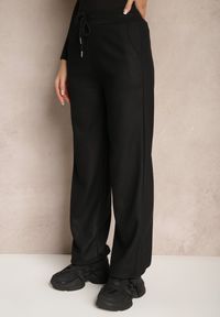 Renee - Czarne Ocieplane Dresowe Spodnie o Szerokim Kroju Nelaithis. Okazja: do domu, na co dzień. Kolor: czarny. Materiał: dresówka. Styl: casual #4