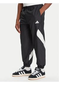 Adidas - adidas Spodnie dresowe Stadium JN1830 Czarny Loose Fit. Kolor: czarny. Materiał: syntetyk #1