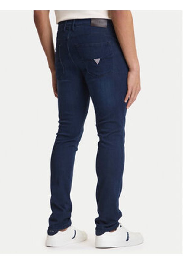 Guess Jeansy M6GAS2 D1086 Granatowy Slim Tapered Fit. Kolor: niebieski