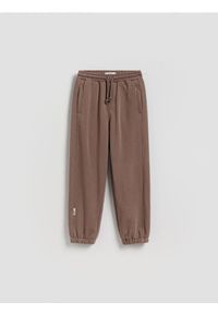 Reserved - Bawełniane spodnie jogger - brązowy. Kolor: brązowy. Materiał: bawełna