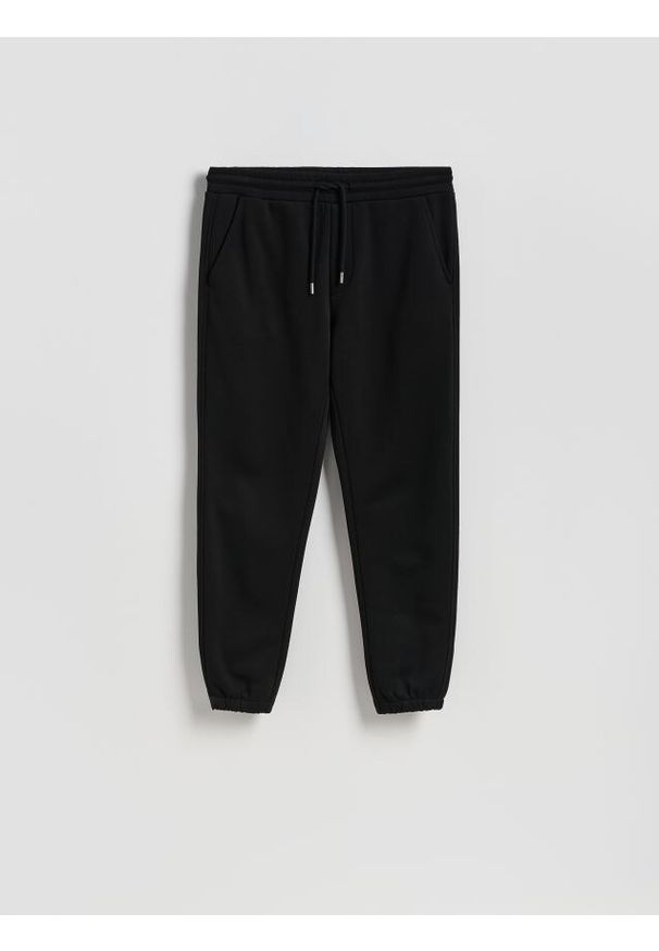Reserved - Spodnie dresowe regular fit - czarny. Kolor: czarny. Materiał: dresówka