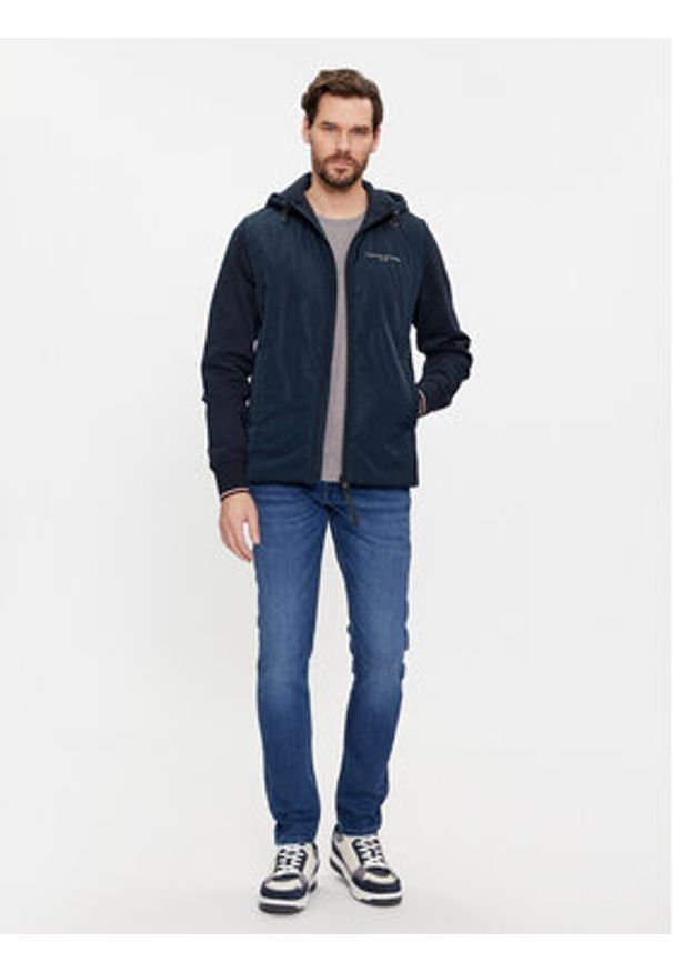 TOMMY HILFIGER - Tommy Hilfiger Jeansy Houston MW0MW33970 Granatowy Tapered Fit. Kolor: niebieski