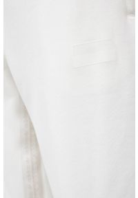 adidas Originals Spodnie H11475 męskie kolor kremowy z aplikacją. Kolor: beżowy. Materiał: bawełna, dzianina. Wzór: aplikacja #5