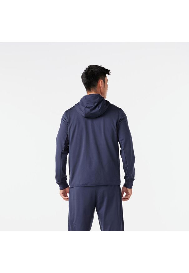 KIPRUN - Bluza do biegania męska Kiprun Run 100 Warm ocieplana. Kolor: niebieski. Materiał: tkanina, prążkowany, poliester, materiał, elastan. Sport: bieganie