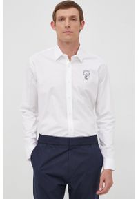 Karl Lagerfeld koszula męska kolor biały regular z kołnierzykiem włoskim. Typ kołnierza: kołnierzyk włoski. Kolor: biały. Długość rękawa: długi rękaw. Długość: długie. Wzór: aplikacja