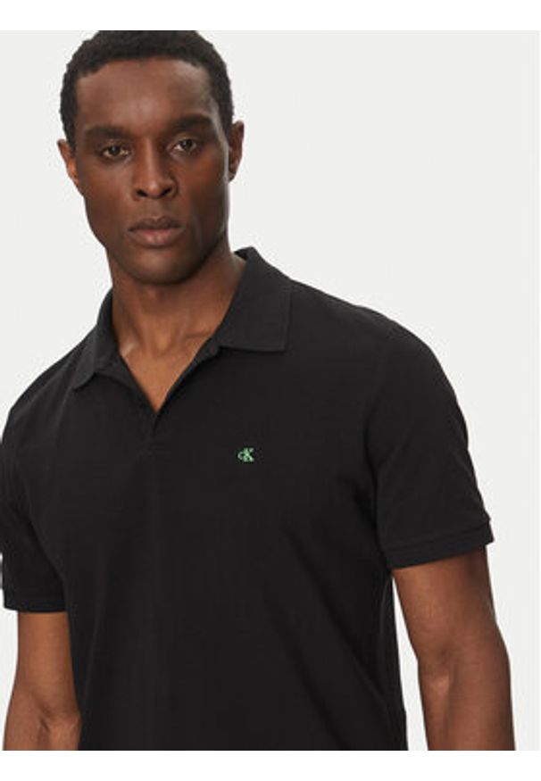 Calvin Klein Jeans Polo LV040EM269 Czarny Regular Fit. Typ kołnierza: polo. Kolor: czarny. Materiał: bawełna