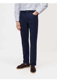 Reserved - Bawełniane spodnie slim fit - granatowy. Kolor: niebieski. Materiał: bawełna