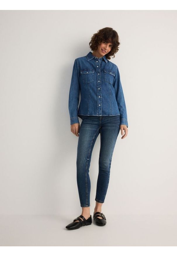 Reserved - Jeansy slim fit ze średnim stanem - niebieski. Kolor: niebieski