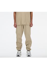 Spodnie męskie New Balance MP41508SOT – beżowe. Kolor: beżowy. Materiał: bawełna, dresówka, tkanina
