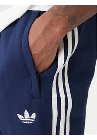 Adidas - adidas Spodnie dresowe 3-Stripes KE3561 Granatowy Slim Fit. Kolor: niebieski. Materiał: syntetyk, bawełna #5