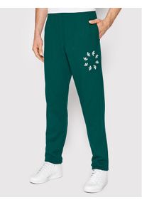 Adidas - adidas Spodnie dresowe adicolor Spinner HC4494 Zielony Regular Fit. Kolor: zielony. Materiał: bawełna, dresówka #1