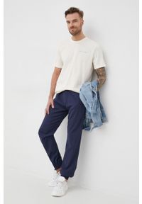 Emporio Armani spodnie wełniane I1P960.I1581 męskie kolor granatowy joggery. Kolor: niebieski. Materiał: wełna #4