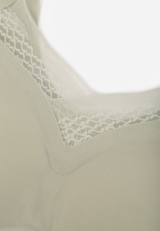 Renee - Zielony Sportowy Biustonosz z Usztywnieniem Ozdobiony Siateczkową Wstawką Edalissa. Kolor: zielony. Rodzaj stanika: wyciągane miseczki. Wzór: aplikacja